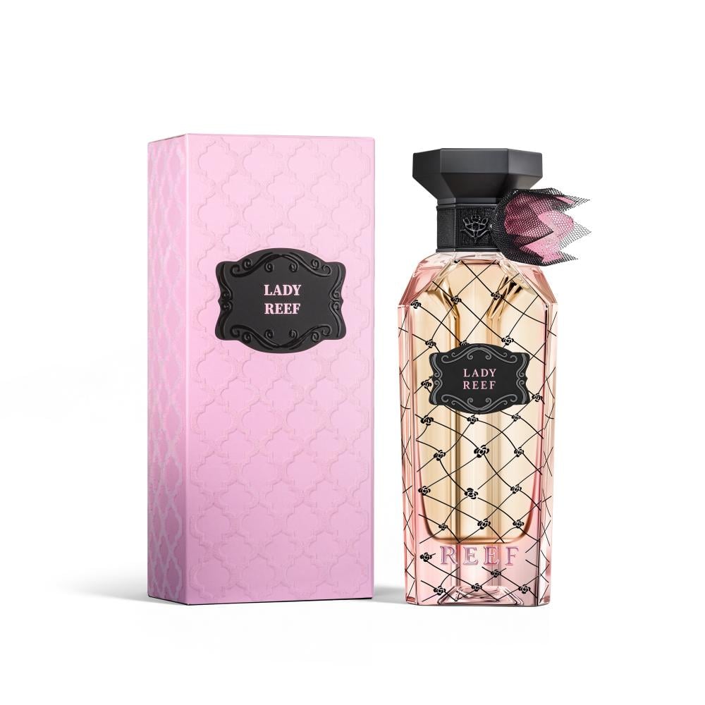Lady Reef perfume bottle with a black cap and pink patterned glass, shown next to its pink textured box on a white background.