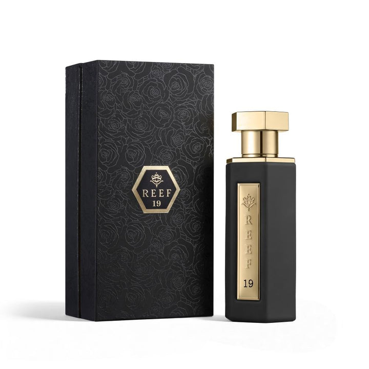 Perfume bottle and packaging with 'REEF 19' branding on a white background