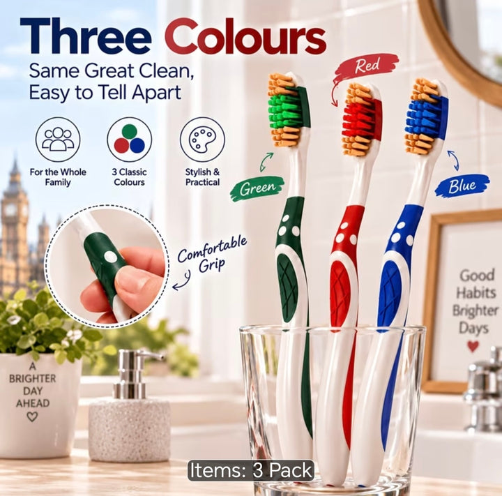 Three toothbrushes in a clear glass cup, shown as a 3-pack in different color combinations: green, red, and blue. The image features promotional text, icons, and lifestyle elements like a bathroom sink and a hand demonstrating the comfortable grip.