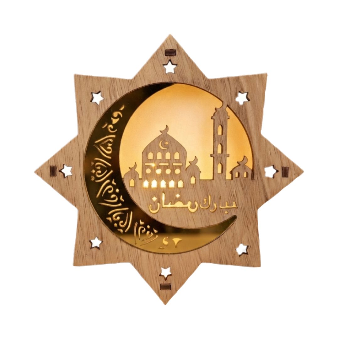A wooden star-shaped Islamic wall hanging with a crescent moon and mosque silhouette, featuring Arabic calligraphy and a warm illuminated center, shown on a plain white background.